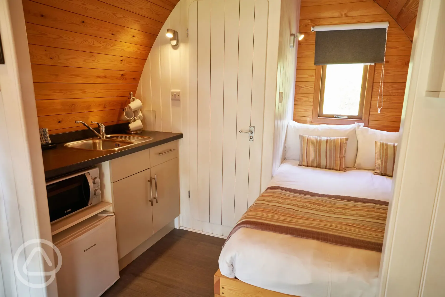 Mega pod double bed and kitchen with a kettle, toaster, fridge and microwave