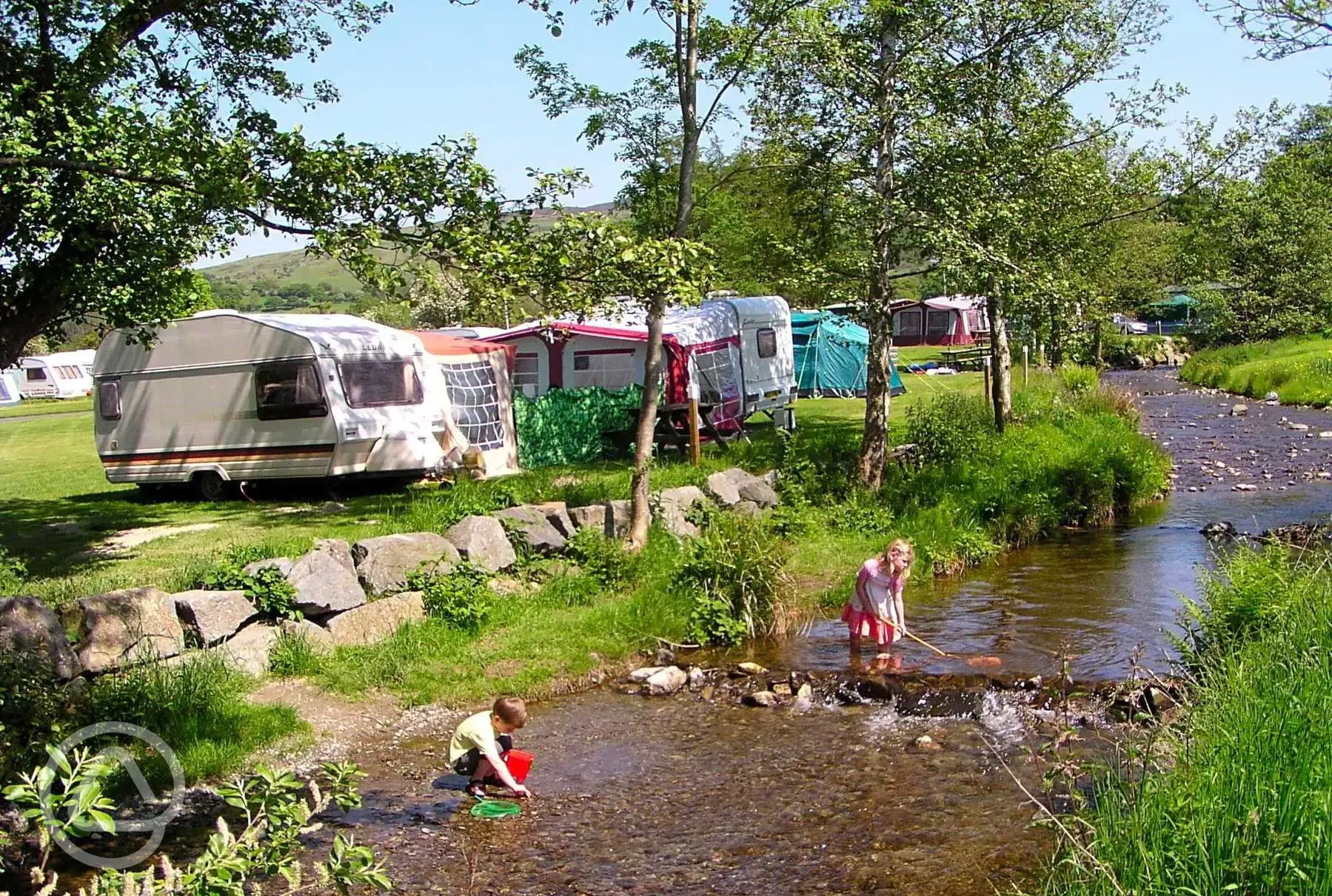 Caravans by the stream