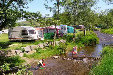 Caravans by the stream