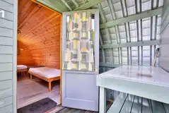 Riverside camping pod sheltered porch