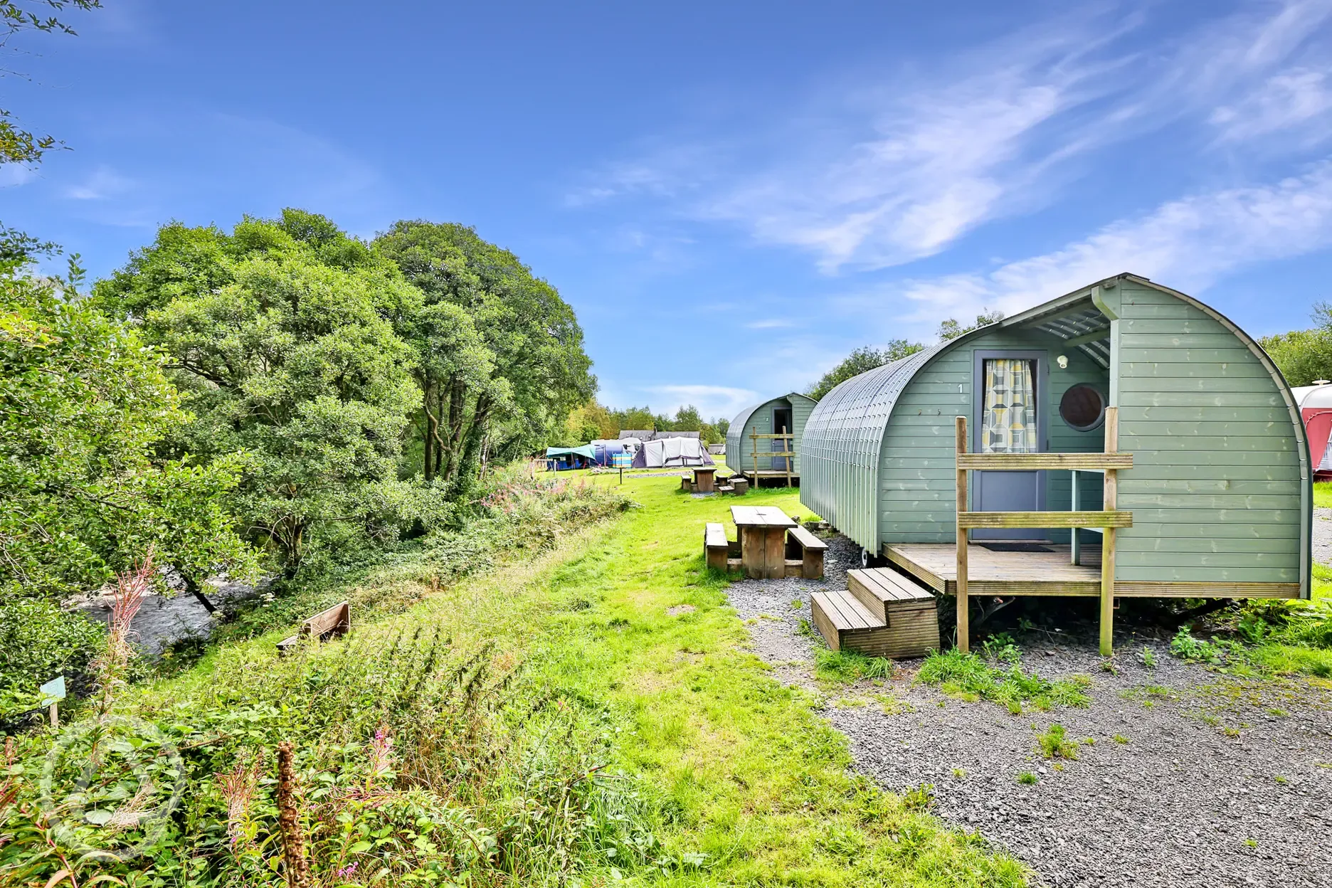 Riverside camping pods