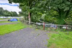 Electric hardstanding pitches beside the river Electric hardstanding pitches beside the river