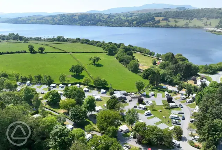 Aerial of Pen y Bont Touring Park near the edge of Llyn Tegid/Bala Lake