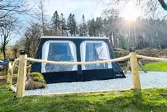 Isabella ready trailer tent with a picnic bench