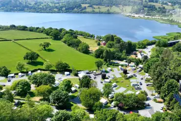 Aerial of Pen y Bont Touring Park near the edge of Llyn Tegid/Bala Lake