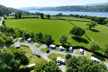 Aerial of Pen y Bont Touring Park near the edge of Llyn Tegid/Bala Lake