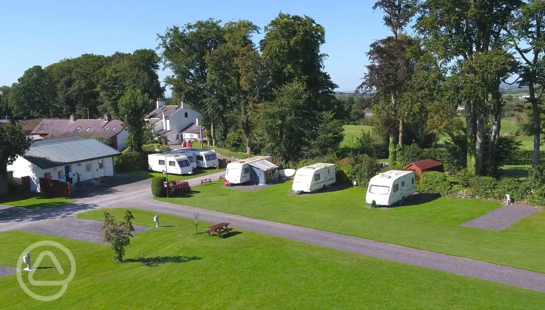 Hardstanding pitches with surrounding grass areas