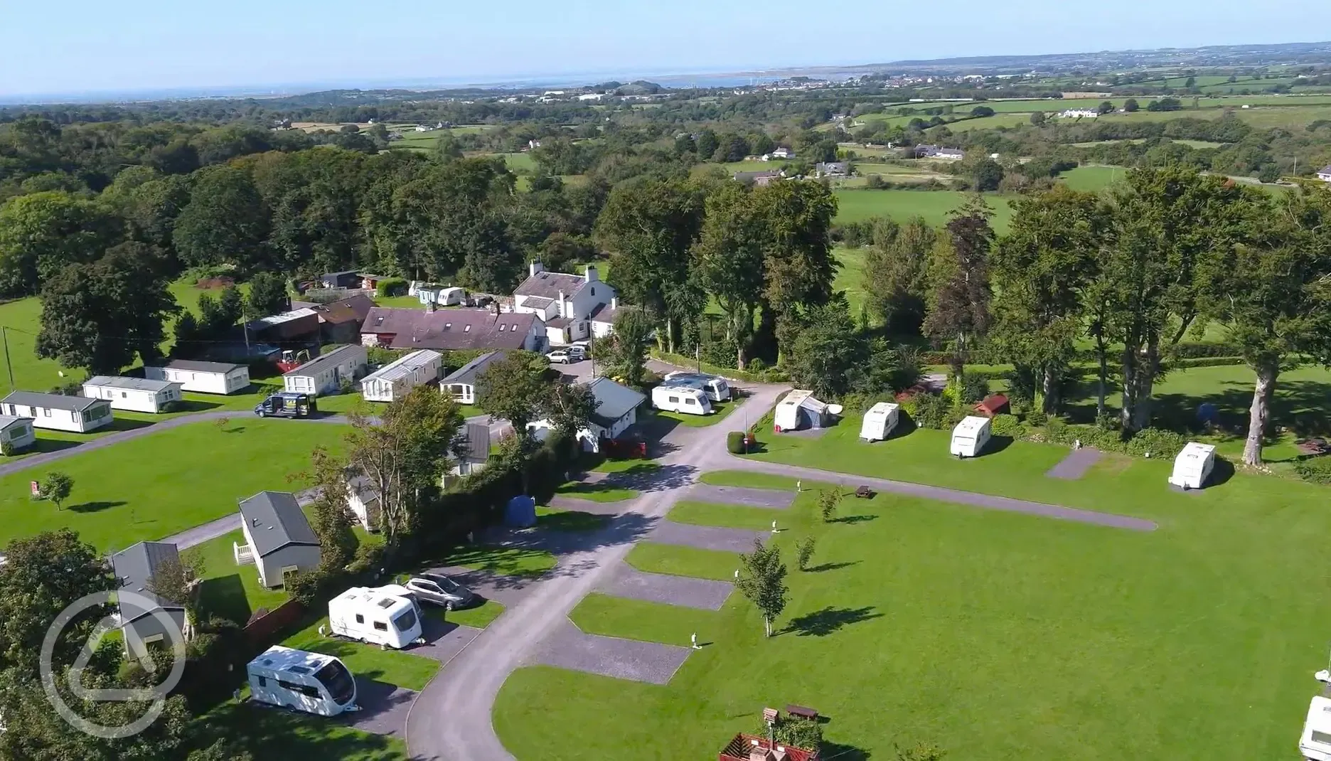 Aerial of Plas Gwyn with the grass and hardstanding pitches