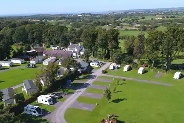 Aerial of Plas Gwyn with the grass and hardstanding pitches