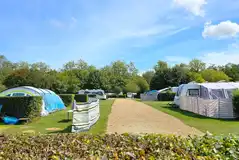 Electric grass pitches with 16 amp hook ups in the main area of the site