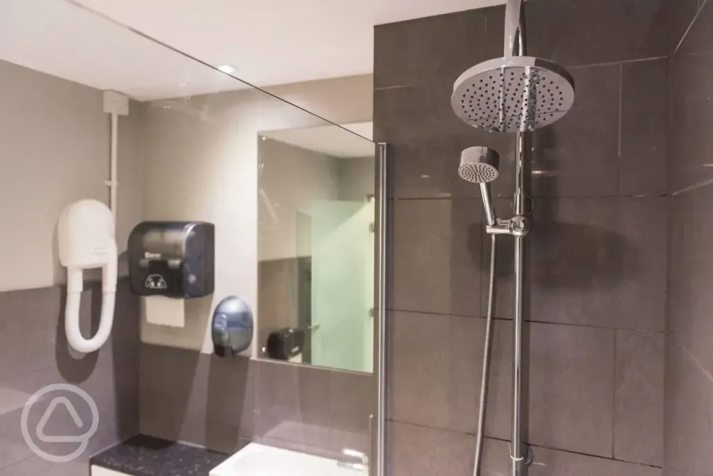 Shower with unlimited hot water and a hair dryer