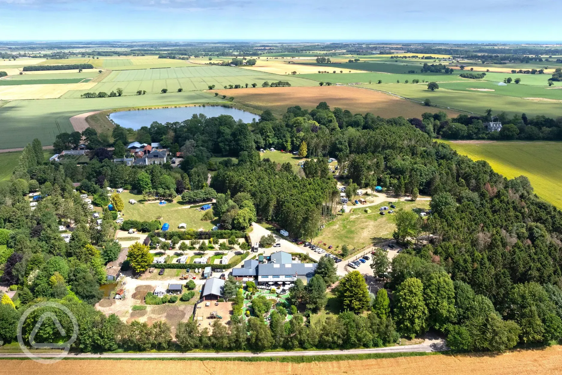 Aerial of Clippesby Hall overlooking Fleggburgh lake and rural views