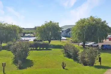 Electric bittern camping pitches overlooking the marina