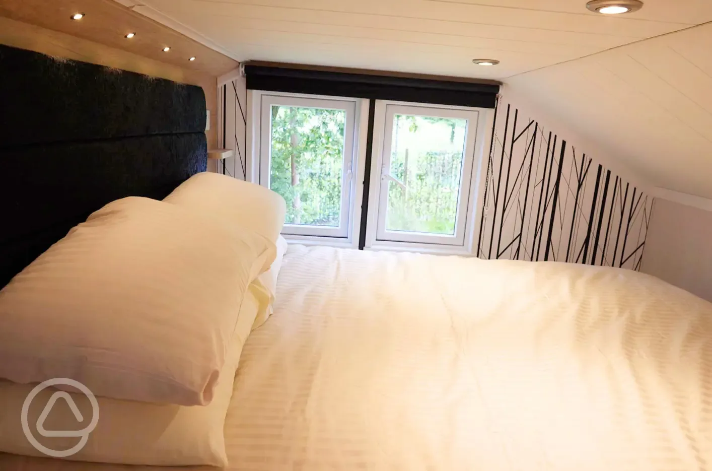 Forest glamping pod mezzanine bunk area