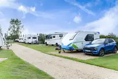 Electric grass and hardstanding pitches at Delph Bank Touring and Glamping Park