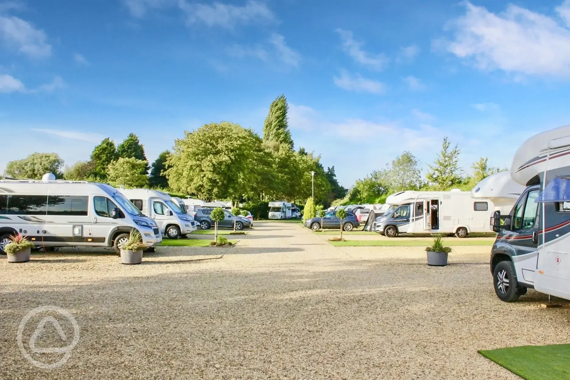 Electric hardstanding and grass pitches