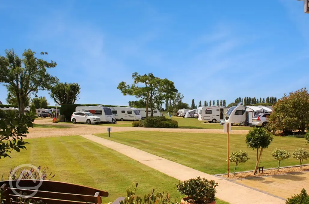 Electric hardstanding and grass pitches