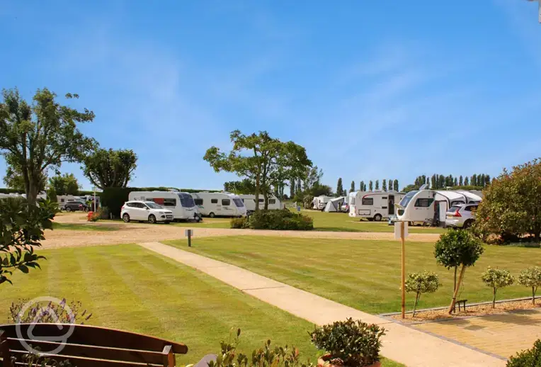 Electric hardstanding and grass pitches