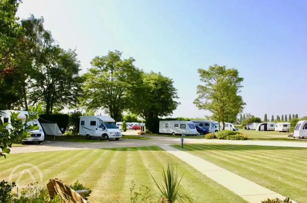 Electric hardstanding and grass pitches