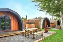 Superior ensuite glamping pods with wood fired hot tubs and fire pits Superior ensuite glamping pods with wood fired hot tubs and fire pits