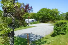 Small fully serviced hardstanding (around 9m x 5.5m) with hedged sides
