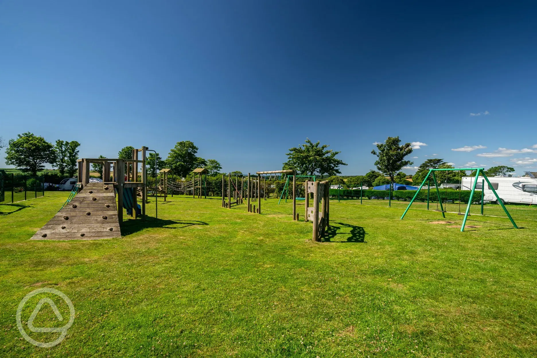 Kid's playground with swings and climbing at Tregarton Park