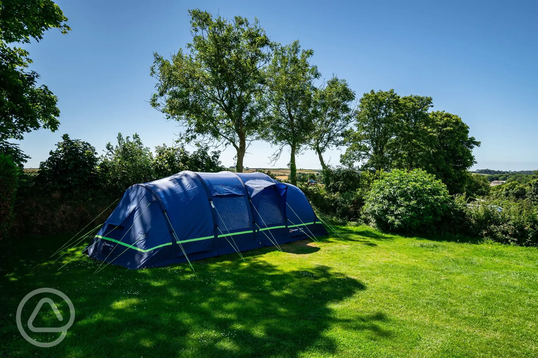 Tent on grass pitches at Tregarton Park