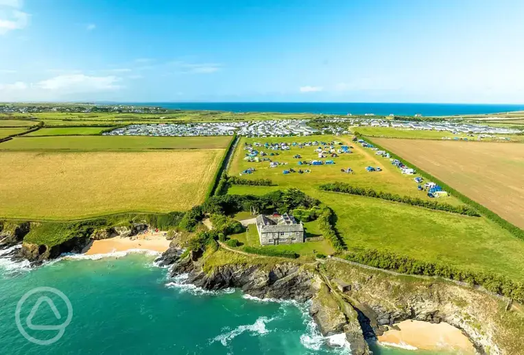 Aerial of Harlyn Sands Holiday Park by the coast