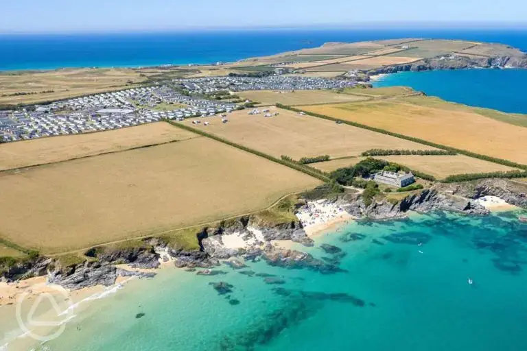 Aerial of Harlyn Sands Holiday Park by the coast