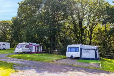 Electric all weather hardstanding pitches (family area)