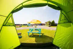 Pre erected tent for hire with a picnic table
