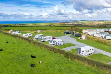 Aerial of the electric hardstanding pitches by the sea