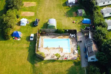Bird's eye view of the solar heated outdoor swimming pool (seasonal)