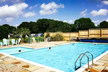 Outdoor solar heated swimming pool