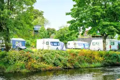 Premium hardstanding and grass pitches by the River Banwy