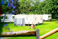 Electric hardstanding touring pitches with awnings welcome (7.6m x 4.9m)