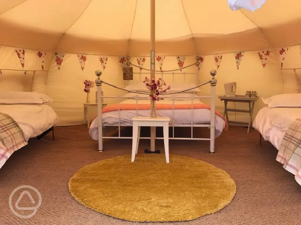Bell tent interior at Broadhembury Holiday Park