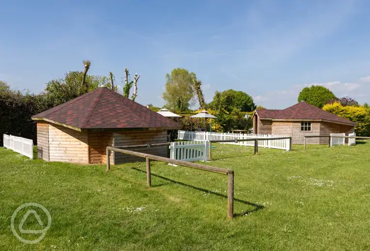 Glamping cabins in fenced area