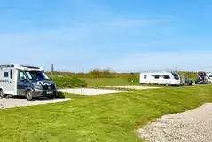Electric hardstanding touring pitches (8m x 8m) Electric hardstanding touring pitches (8m x 8m)