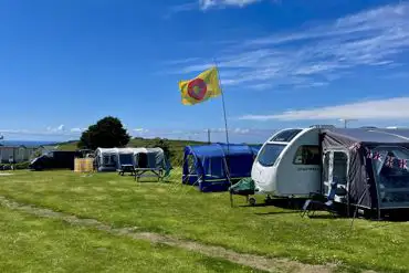 Electric grass pitches at Roselands Caravan and Camping Park