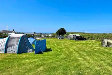 Electric grass pitches at Roselands Caravan and Camping Park