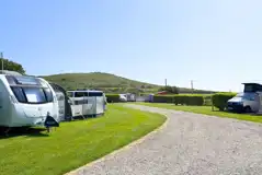 Grass pitches suitable for all unit types up to 6m in length