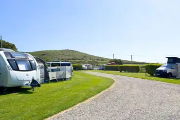 Grass pitches suitable for all unit types up to 6m in length