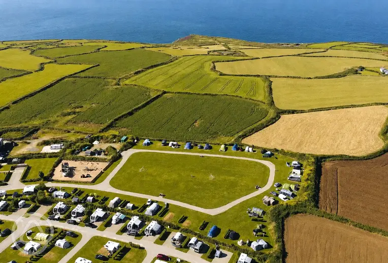 Aerial of Trevalgan Touring Park and the Cornish coast