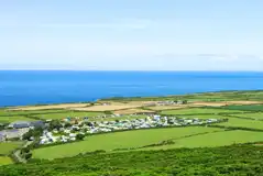 Aerial of Trevalgan Touring Park and the Cornish coast