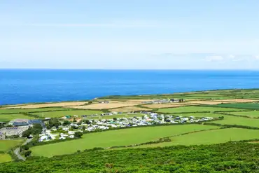 Aerial of Trevalgan Touring Park and the Cornish coast