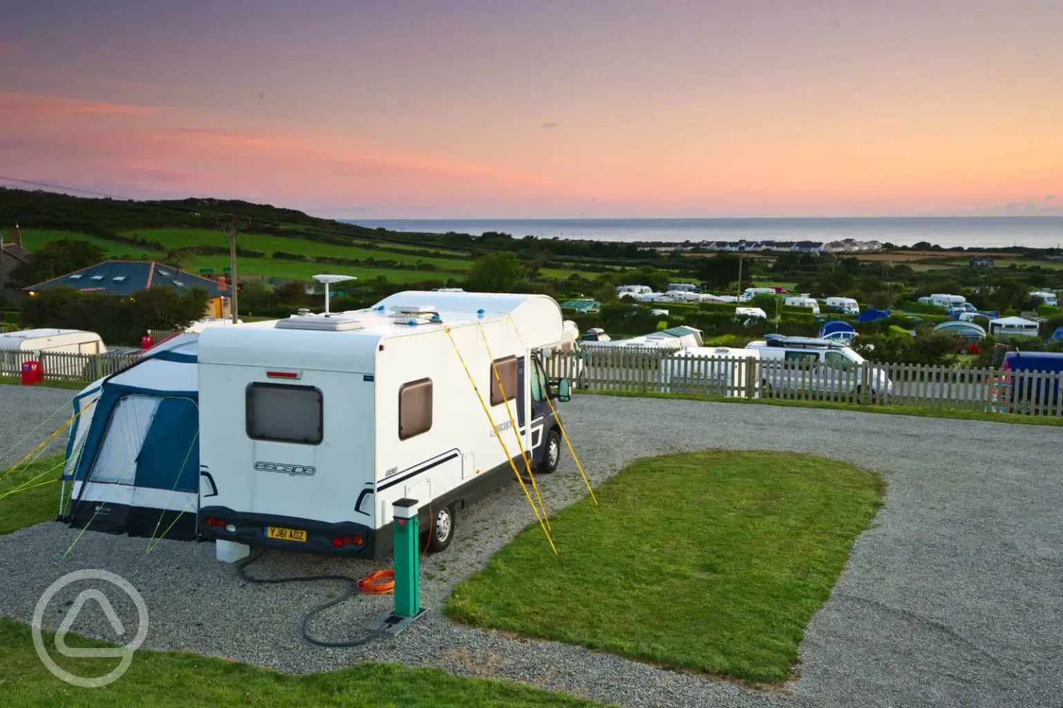Fully serviced hardstanding pitches at sunset