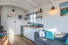 Hut kitchen with a hob, microwave, fridge, toaster, oven, air fryer and kettle Hut kitchen with a hob, microwave, fridge, toaster, oven, air fryer and kettle