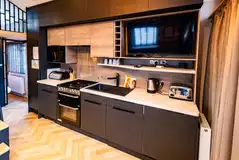 Designer studio suite kitchen with a hob, microwave, fridge, oven and air fryer Designer studio suite kitchen with a hob, microwave, fridge, oven and air fryer