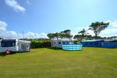 Tourers on electric grass pitches with awning space